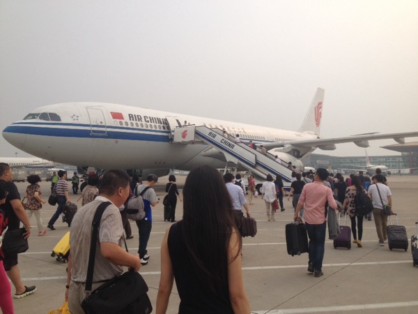 Walking out to the brand new Airbus at Beijing airport. &nbsp;Next stop Sydney.