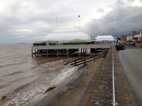 Burnham-On-Sea - typical english seaside holiday town. Yes, there appeared to be a beach for swimming - Good Luck.