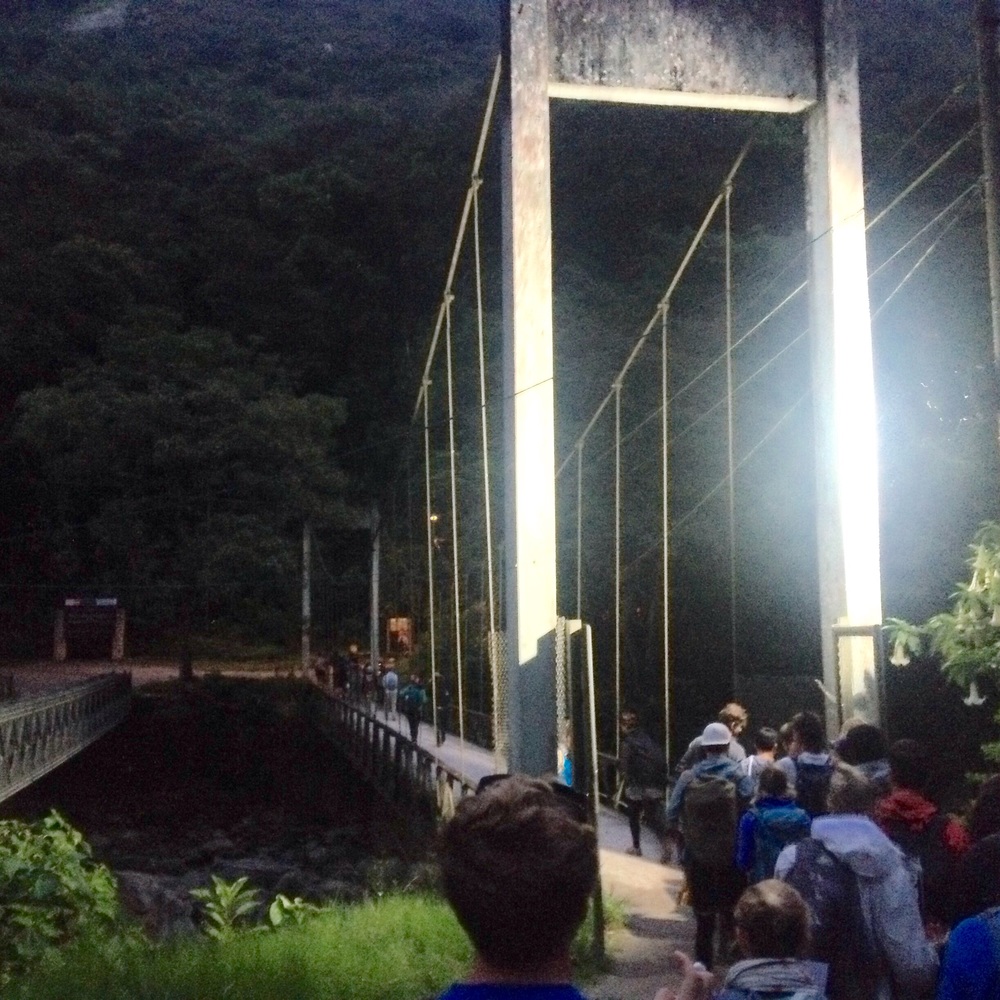 The walking bridge opened at 5:00 after 30 mins walk in the dark.