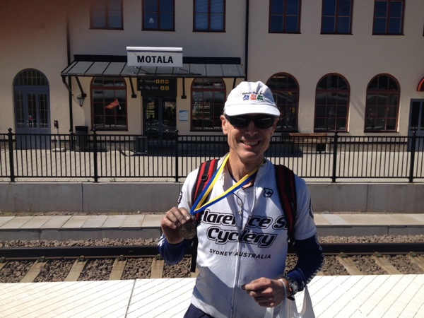 Leaving Motola by train to Stockholm- I do love that medal.
