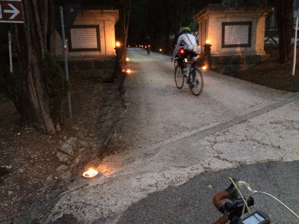 Oil lights lit the first gravel section at Castello di Brolio