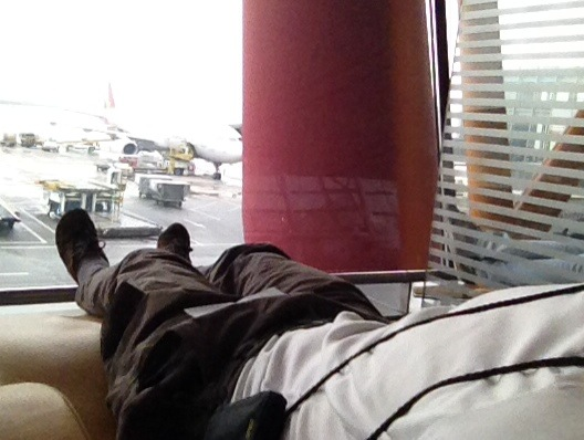 Beijing Airport - resting in the transit area, trying to recover from the adverse reaction to the breakfast food. This is not the spot I slept through and missed my connection, but similar.
